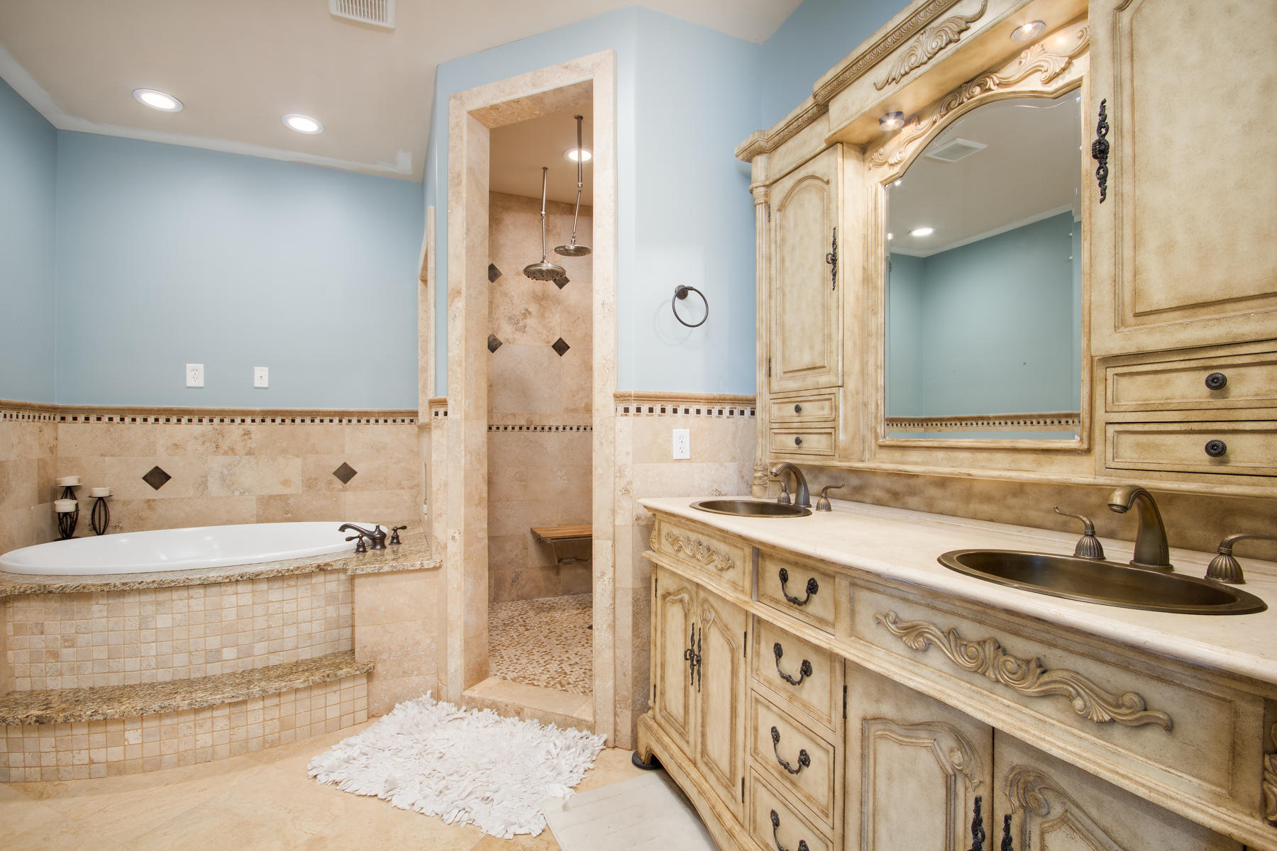 143 Pepper Tree Road Santa Rosa Beach, FL 32459 - Photo 11 of 28 a large bathroom with a double vanity sink a mirror and a shower