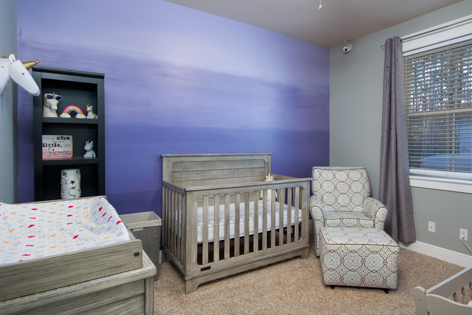 143 Pepper Tree Road Santa Rosa Beach, FL 32459 - Photo 12 of 28 a bedroom with a bed and a baby crib