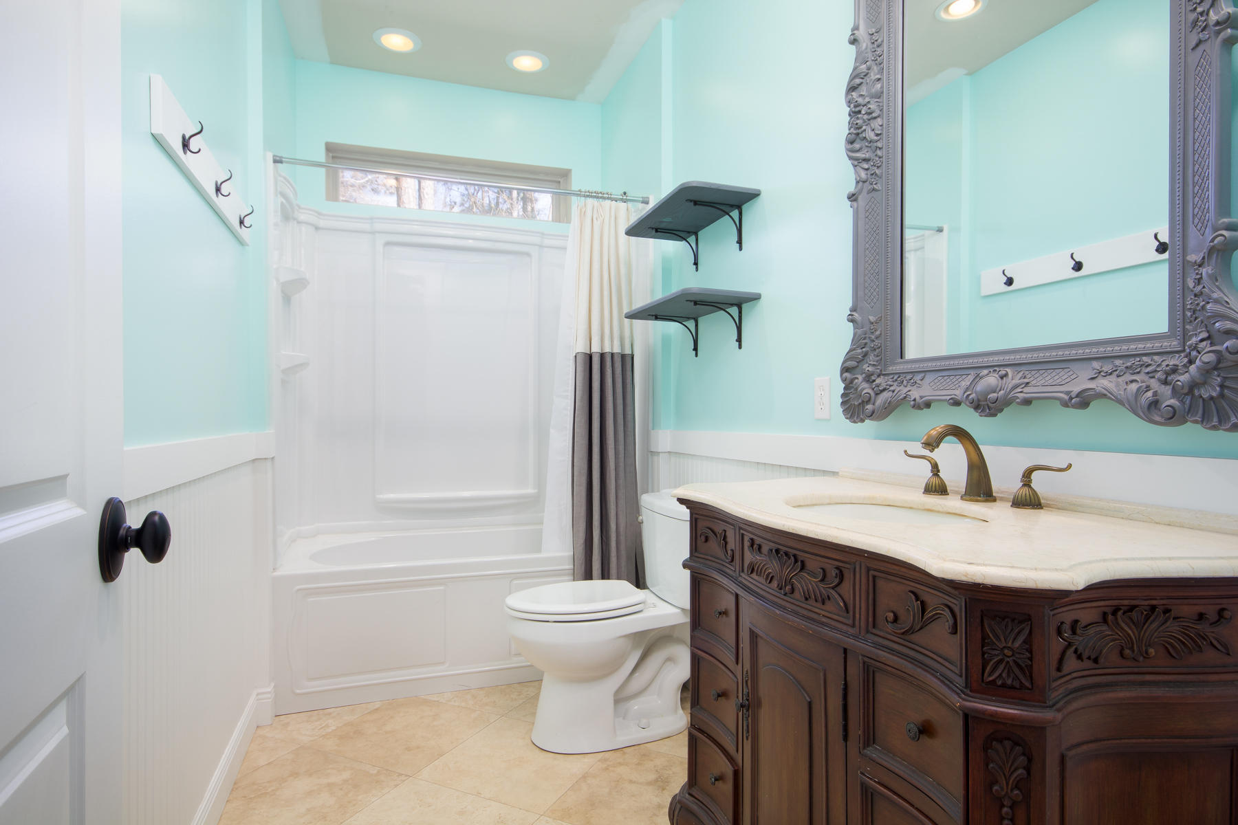 143 Pepper Tree Road Santa Rosa Beach, FL 32459 - Photo 14 of 28 a bathroom with a granite countertop sink a toilet and a mirror