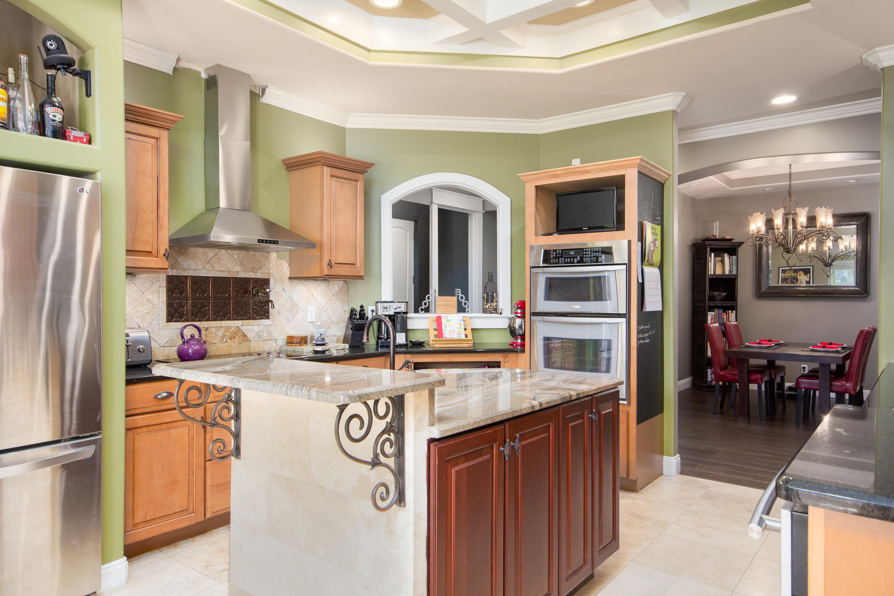 143 Pepper Tree Road Santa Rosa Beach, FL 32459 - Photo 15 of 28 a kitchen with stainless steel appliances granite countertop a stove and a refrigerator