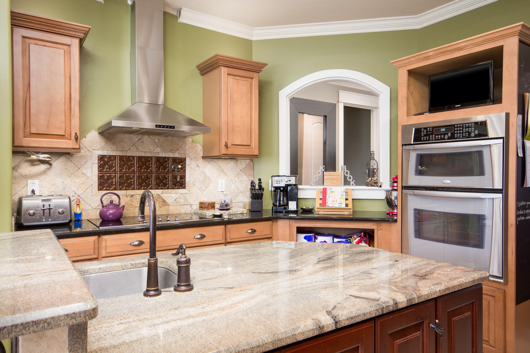143 Pepper Tree Road Santa Rosa Beach, FL 32459 - Photo 16 of 28 a kitchen with a sink a stove and microwave