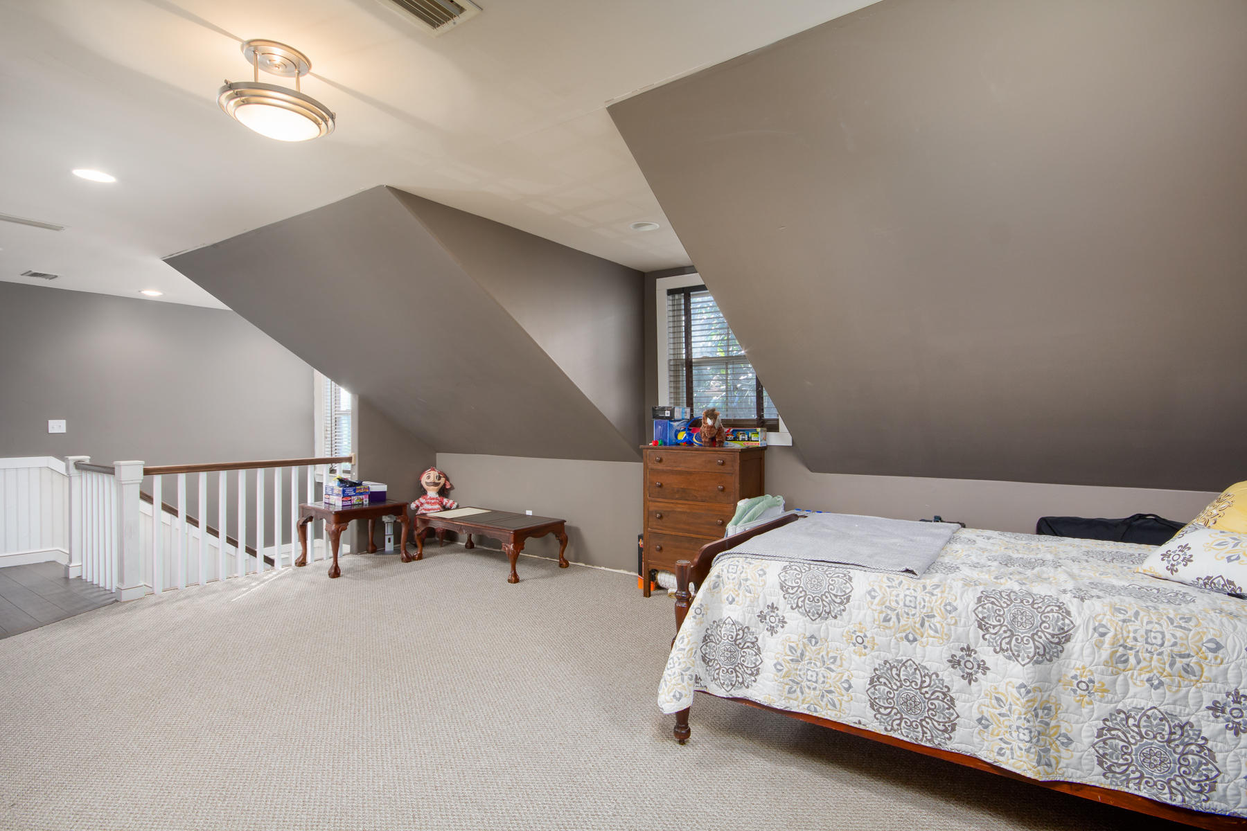 143 Pepper Tree Road Santa Rosa Beach, FL 32459 - Photo 23 of 28 a bedroom with a bed and a chandelier
