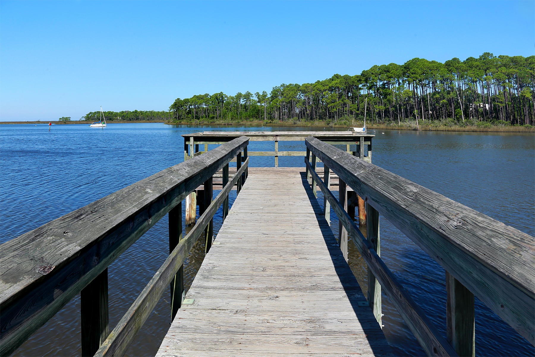 143 Pepper Tree Road Santa Rosa Beach, FL 32459 - Photo 26 of 28 a view of wooden floor and lake