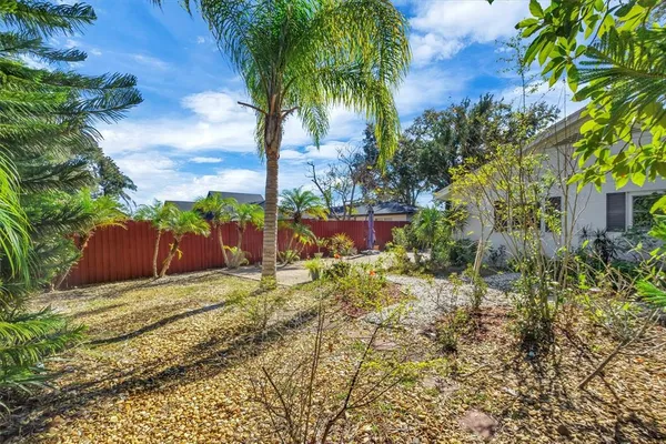 an aerial view of residential houses with city and lake view