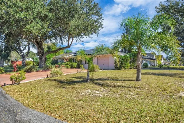 a house with trees in front of it