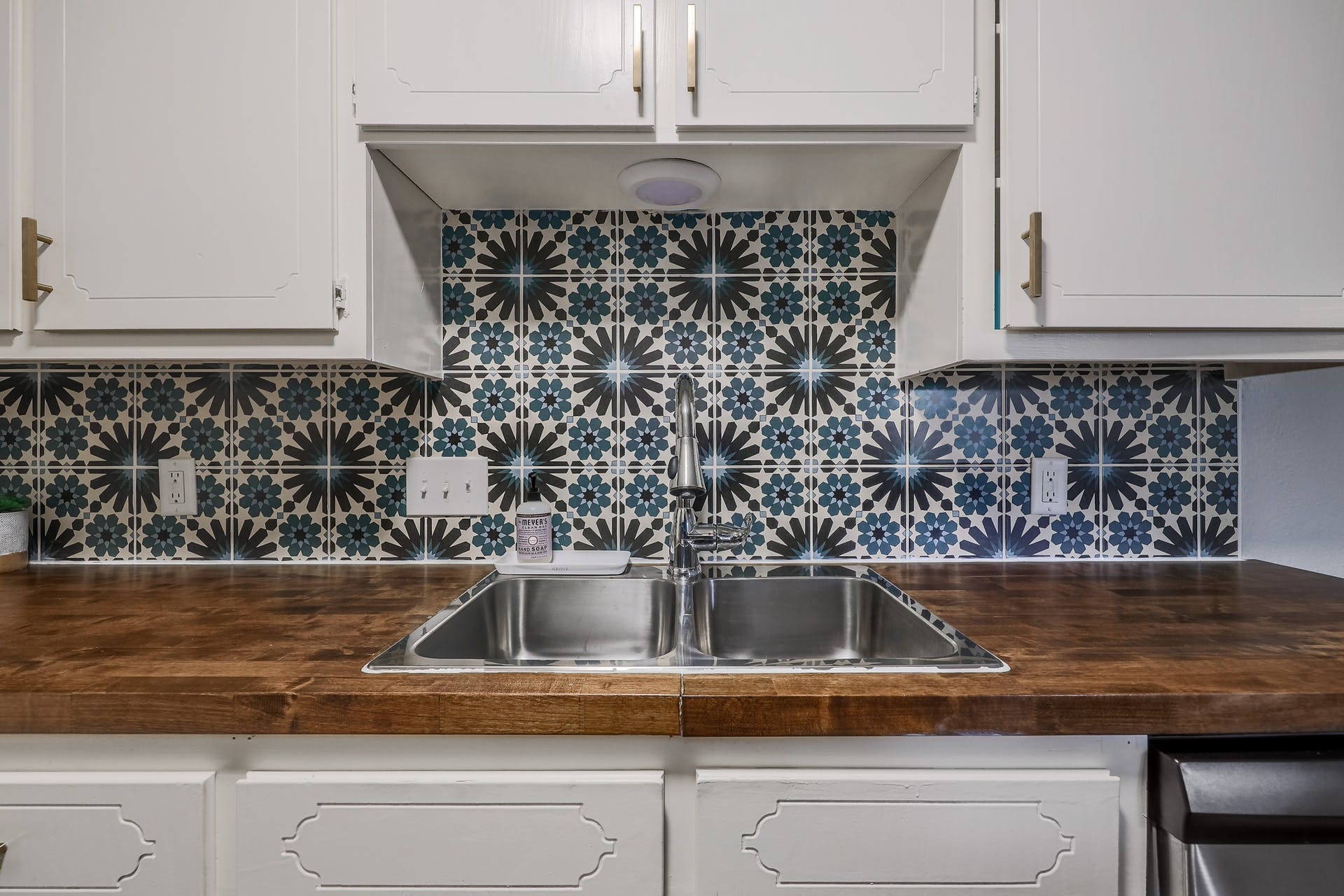 11118 Wandering Way, Unit A Austin, TX 78754 - Photo 14 of 29 a close view of sink with granite counter top