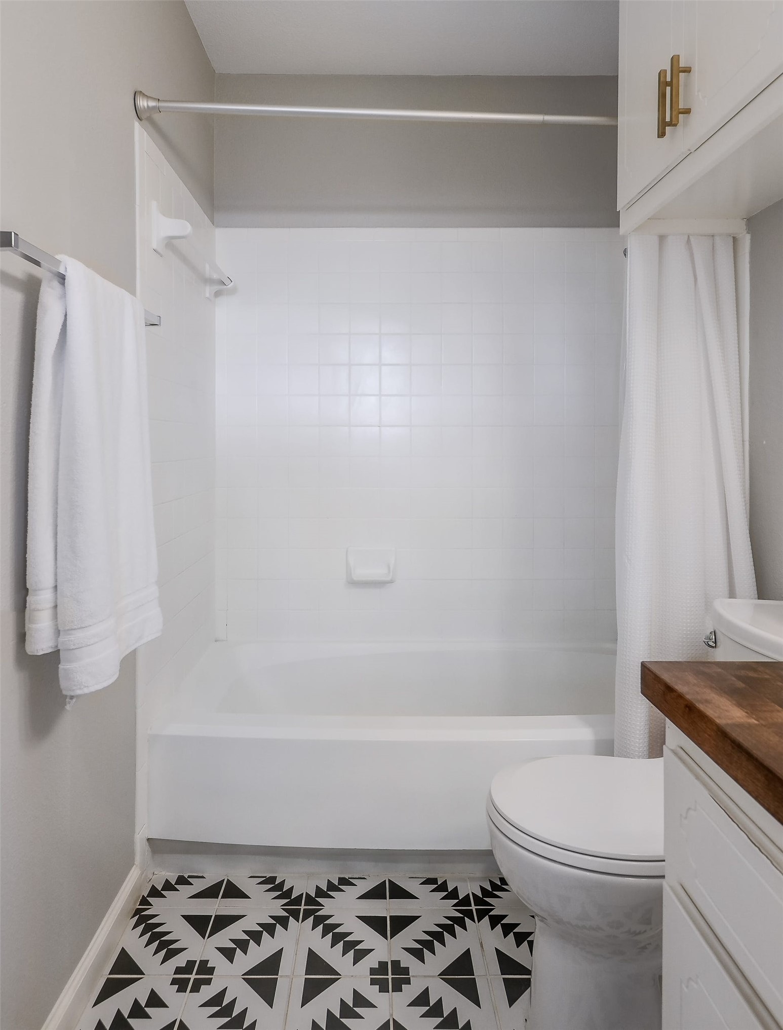 11118 Wandering Way, Unit A Austin, TX 78754 - Photo 27 of 29 a bathroom with a sink and a toilet