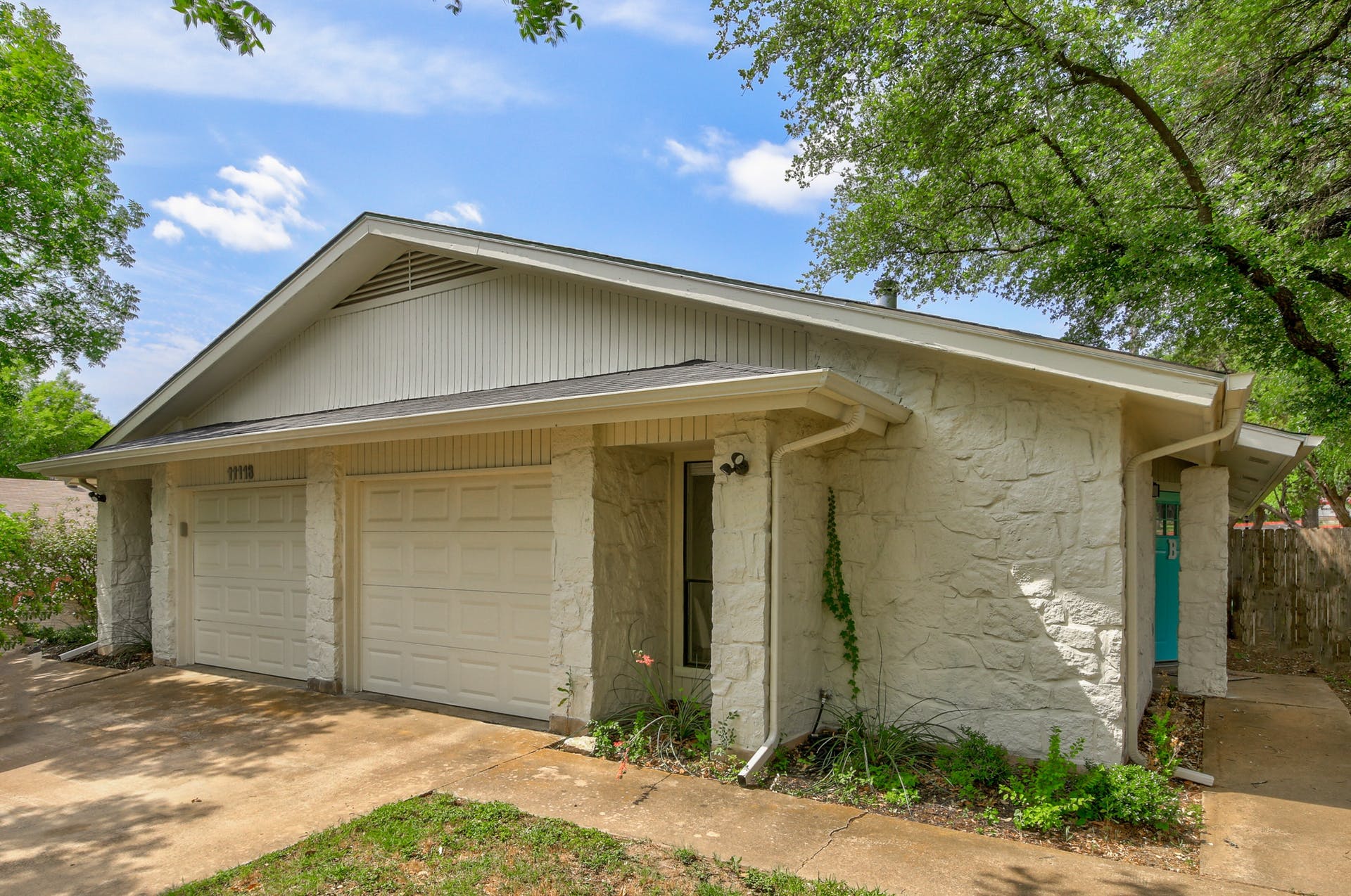 11118 Wandering Way, Unit A Austin, TX 78754 - Photo 4 of 29 a front view of a house