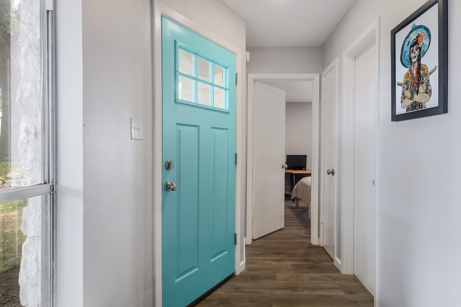 11118 Wandering Way, Unit A Austin, TX 78754 - Photo 5 of 29 a view of an entryway with wooden floor