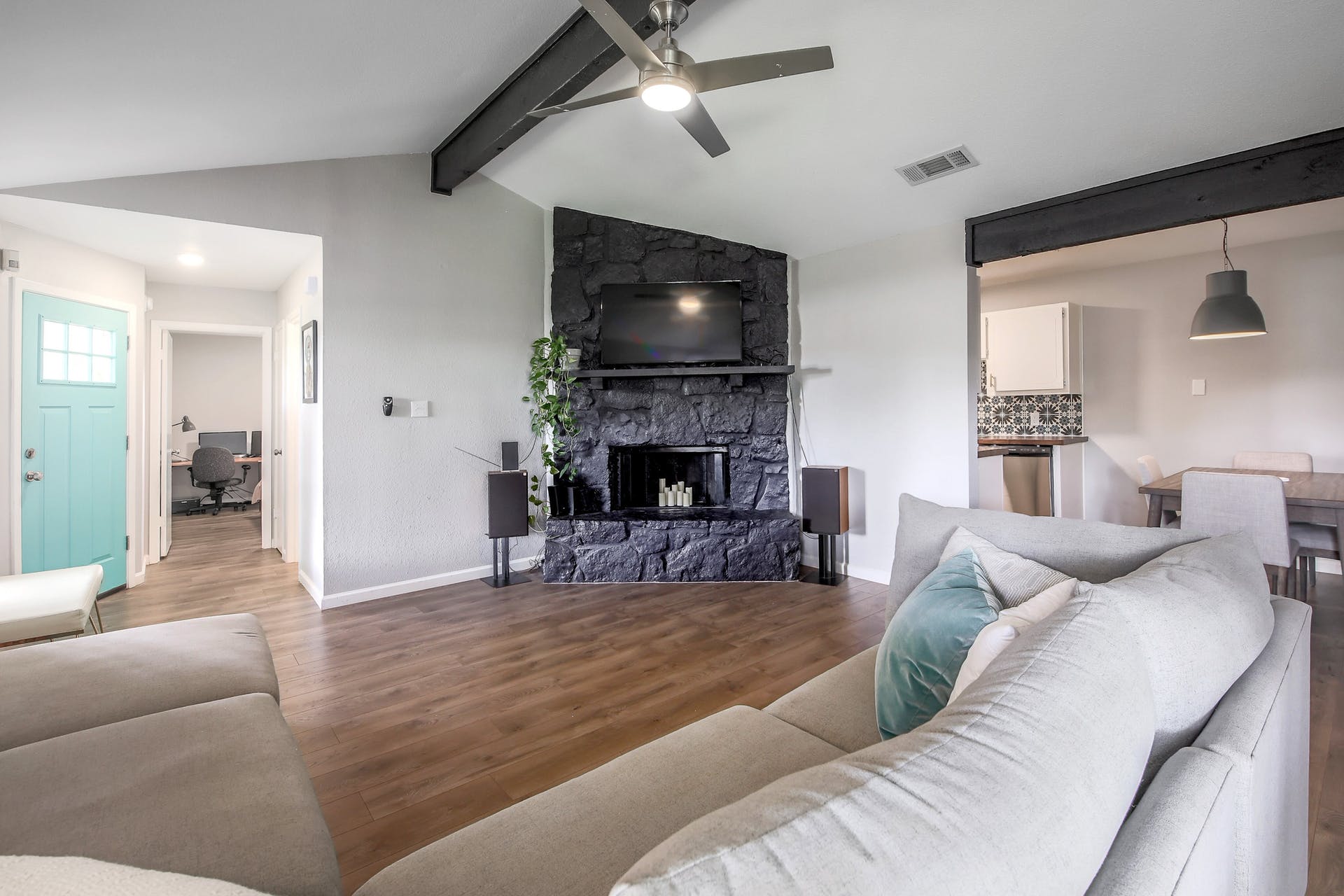 11118 Wandering Way, Unit A Austin, TX 78754 - Photo 8 of 29 a living room with furniture and a fireplace