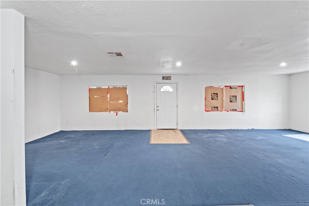 32900 Dune Road Newberry Springs, CA 92365 - Photo 15 of 40 a view of a room with a hallway