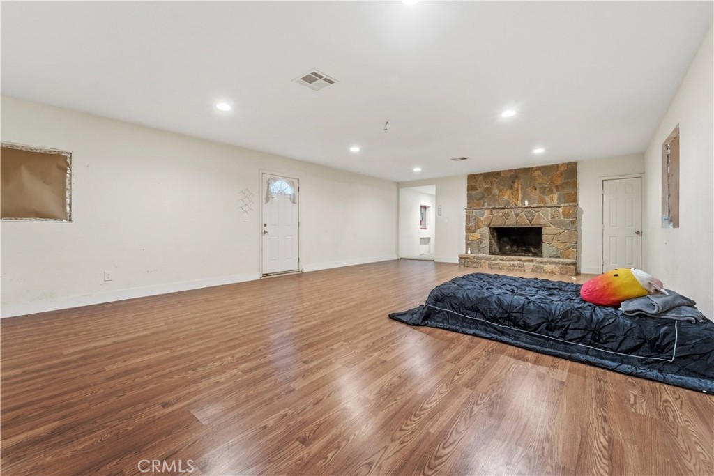 32900 Dune Road Newberry Springs, CA 92365 - Photo 19 of 40 a living room with furniture and a fireplace