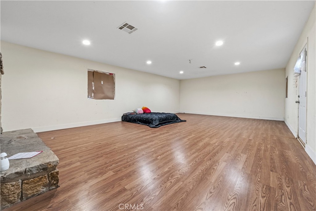32900 Dune Road Newberry Springs, CA 92365 - Photo 20 of 40 a very nice looking room with wooden floor