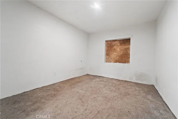 an empty room with a window