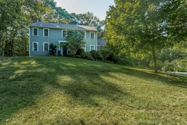 19 Calvin Road Weston, CT 06883 - Photo 1 of 1 a view of a house with a backyard