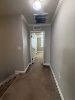 wooden floor and window in an empty room