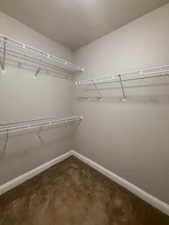 a view of a room with racks on the wall