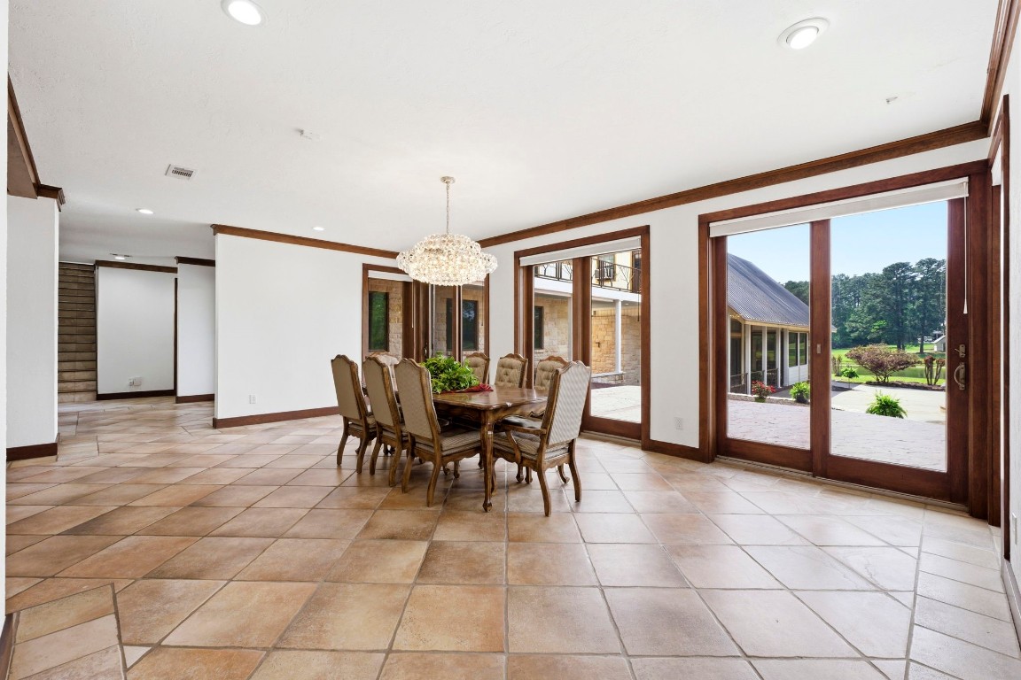 43 Pool Road Richards, TX 77873 - Photo 17 of 50 a view of a dining room with furniture window and outside view