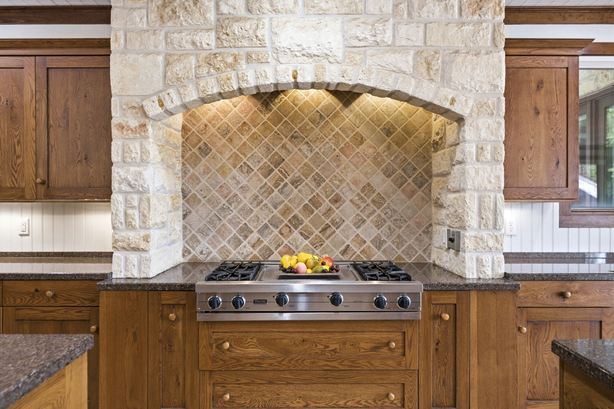 43 Pool Road Richards, TX 77873 - Photo 19 of 50 The Viking gas cooktop is fit for a chef with the attractive stone framing, 4 gas burners and a center griddle. This station also offers drawers and 2 pull-out spice-rack cabinets for extra storage.