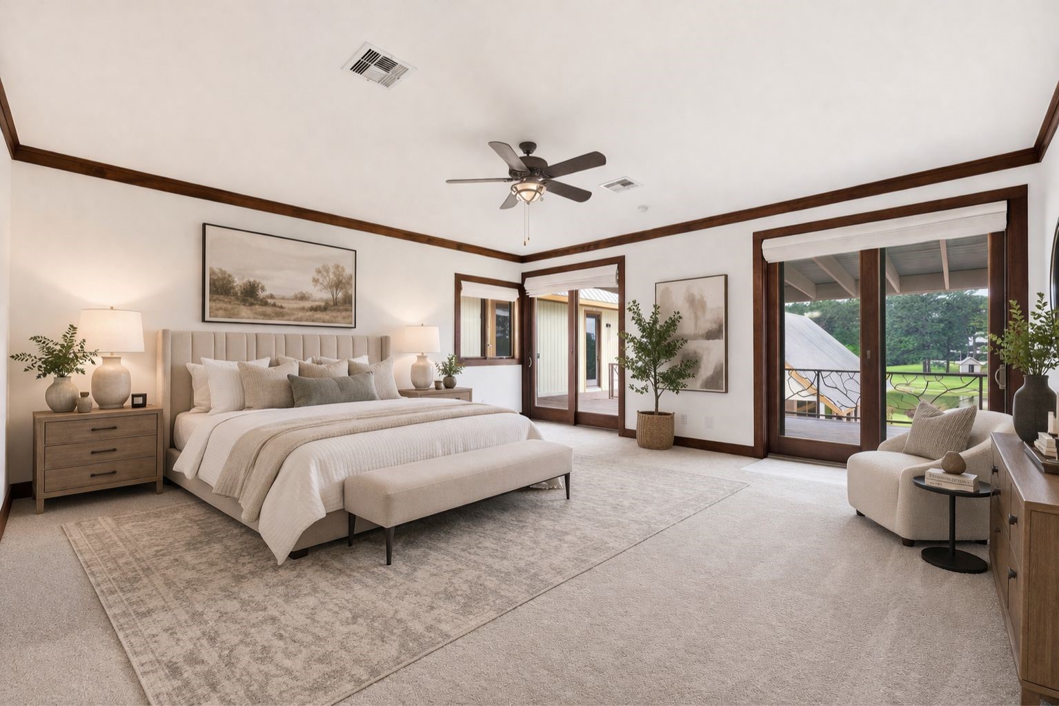 43 Pool Road Richards, TX 77873 - Photo 26 of 50 The upstairs primary bedroom has an immense amount of space for a king bedroom set and a sitting area to enjoy relaxing while taking in the views of the serene landscape. (AI staged)