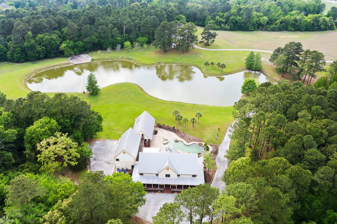 43 Pool Road Richards, TX 77873 - Photo 50 of 50 an aerial view of a house with a swimming pool and garden view