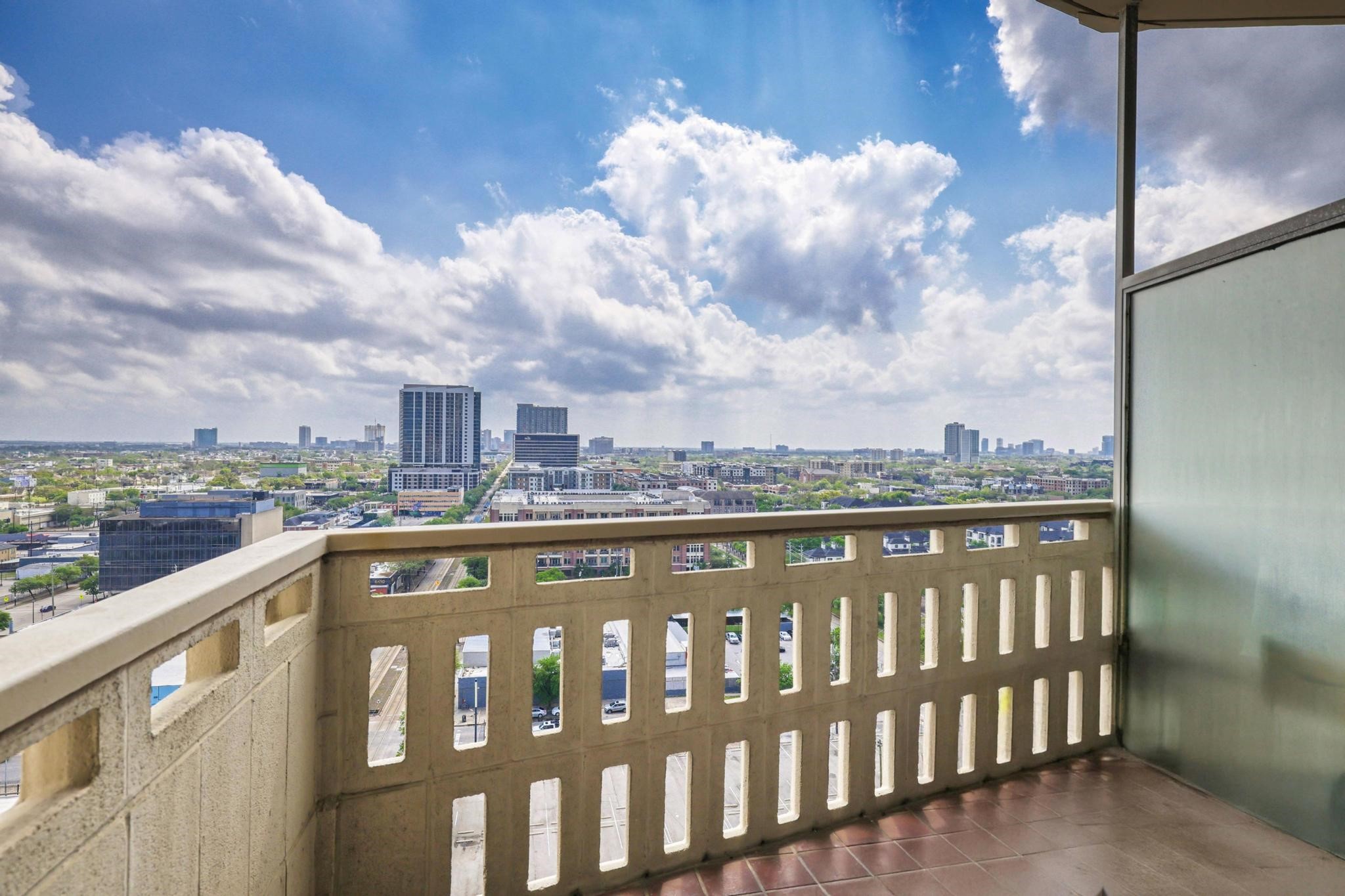 2016 Main Street, Unit 1502 Houston, TX 77002 - Photo 12 of 20 a view of city from a balcony