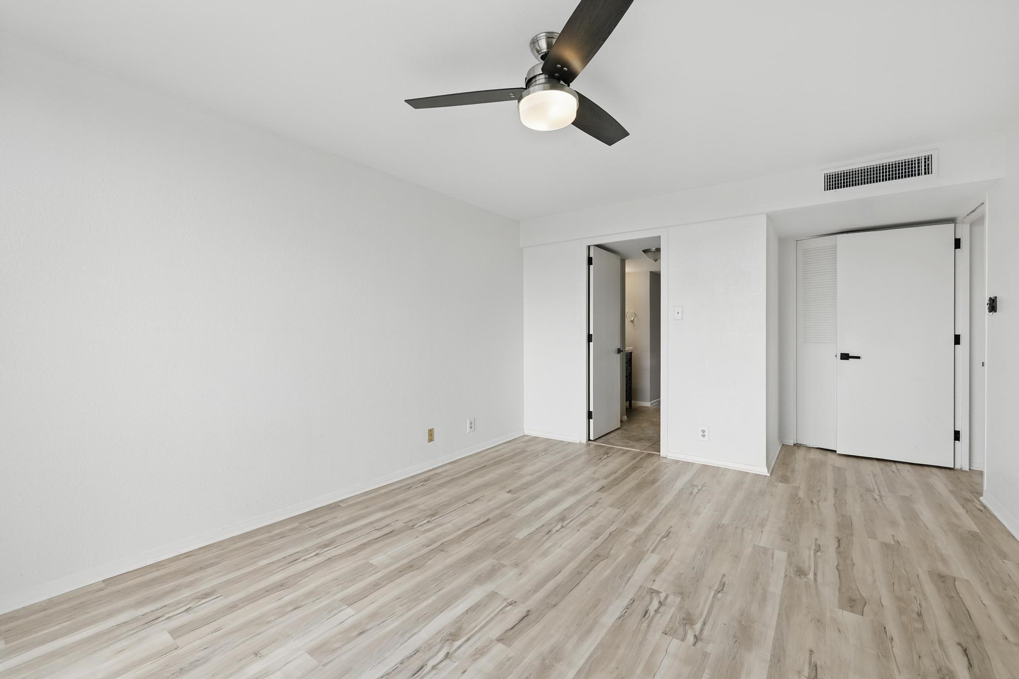 2016 Main Street, Unit 1502 Houston, TX 77002 - Photo 6 of 20 wooden floor in an empty room