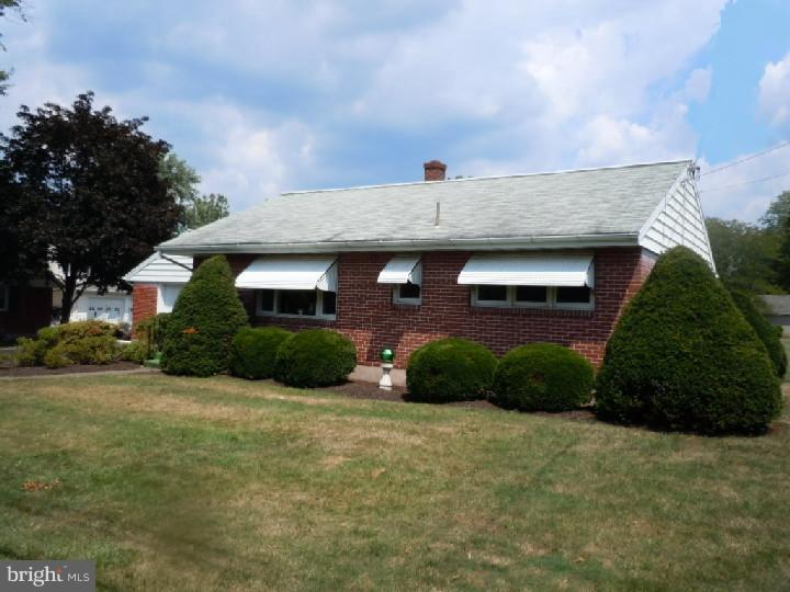 168 South Pleasantview Road Pottstown, PA 19464 - Photo 1 of 13 a front view of a house with a yard