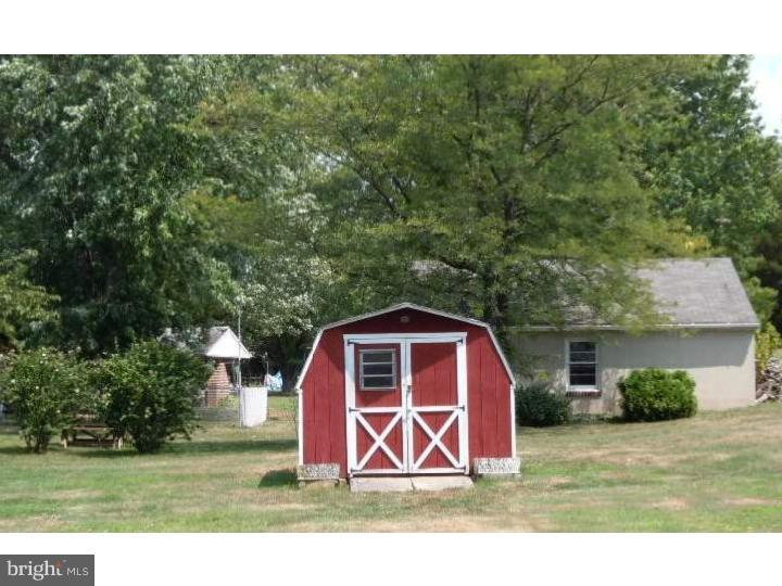 168 South Pleasantview Road Pottstown, PA 19464 - Photo 13 of 13 a view of a barn with a yard