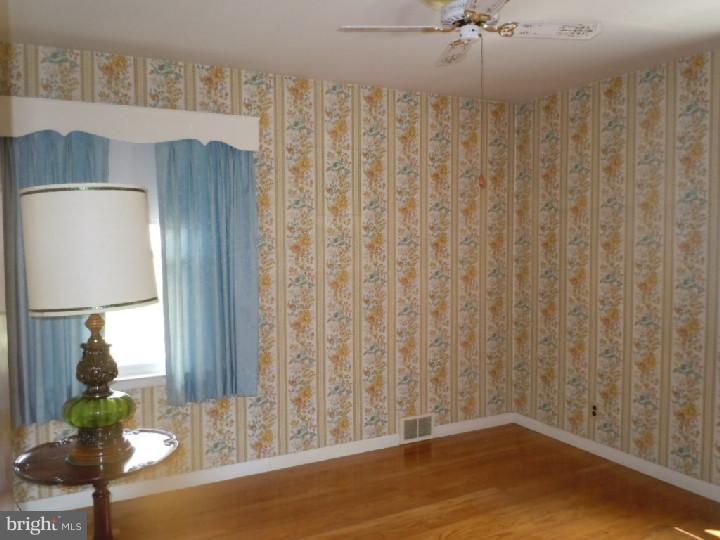 168 South Pleasantview Road Pottstown, PA 19464 - Photo 6 of 13 a view of a room with wooden floor and table