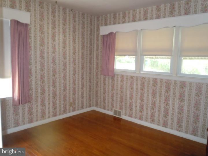 168 South Pleasantview Road Pottstown, PA 19464 - Photo 7 of 13 a view of an empty room with a window