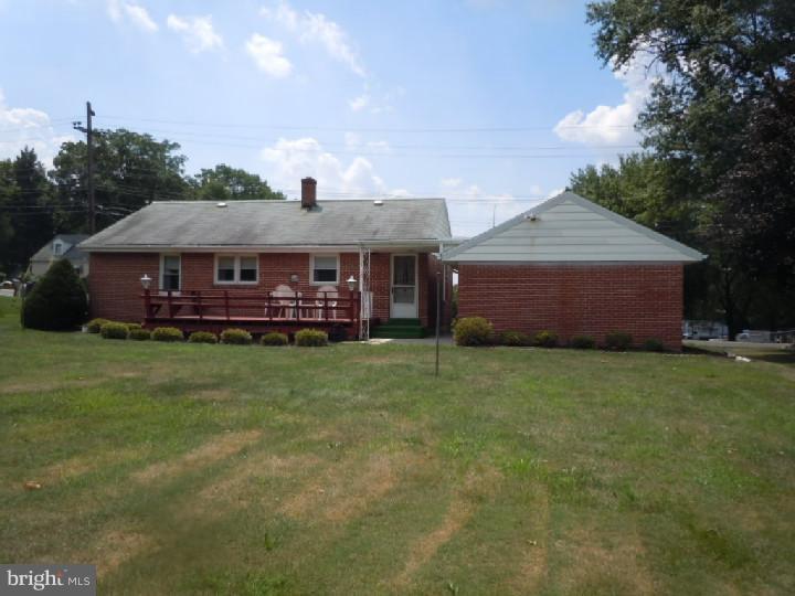168 South Pleasantview Road Pottstown, PA 19464 - Photo 10 of 13 a front view of house with outdoor space and garden