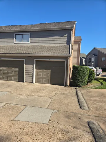 a house view with a outdoor space
