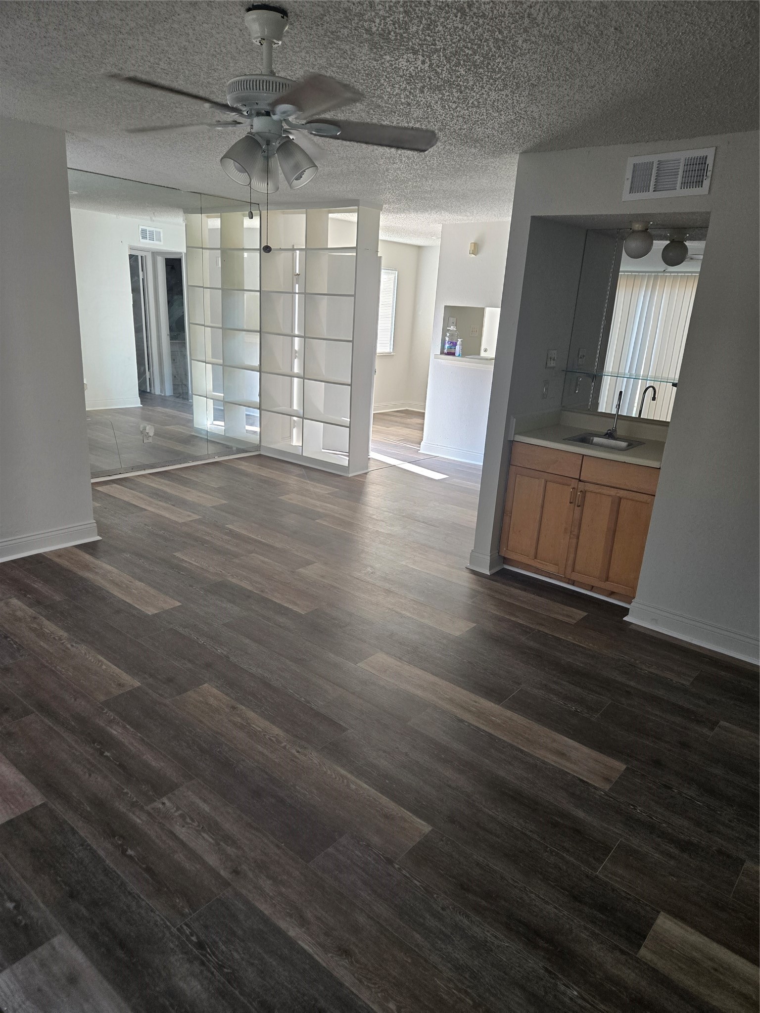 6701 Sands Point Drive, Unit 42 Houston, TX 77074 - Photo 5 of 12 a view of entryway with wooden floor