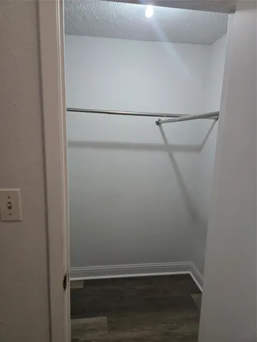 a view of small space with racks on the wall