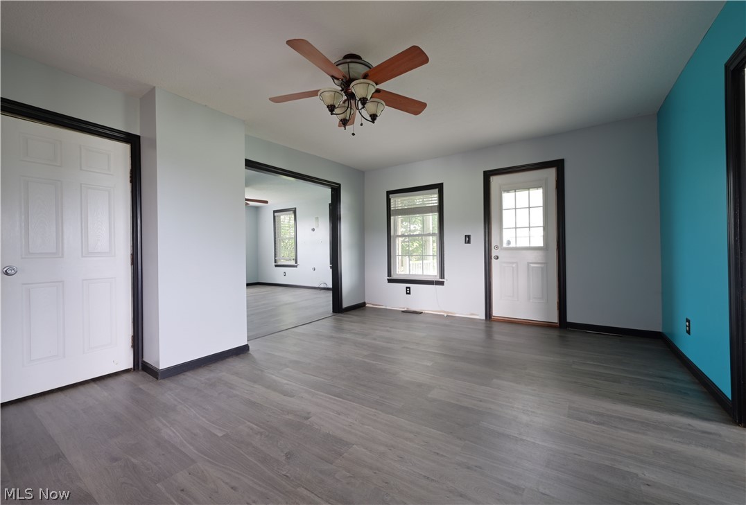 19105 Whitehead Road Lagrange, OH 44050 - Photo 9 of 37 Unfurnished bedroom with ceiling fan and hardwood / wood-style floors