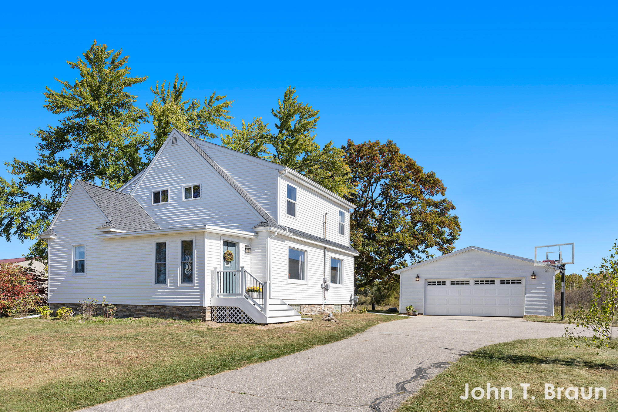2050 West County Line Road Sand Lake, MI 49343 - Photo 3 of 38 front hm