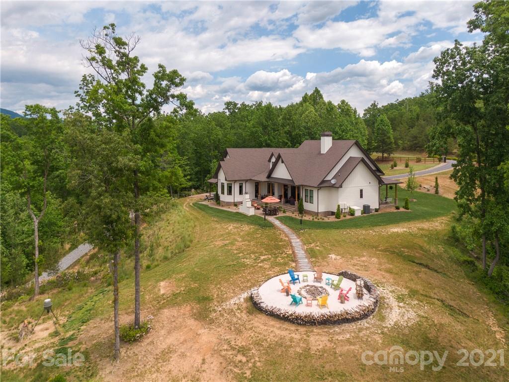 570 Parkway North Rd Mill Spring Mill Spring, NC 28756 - Photo 40 of 48 a aerial view of a house