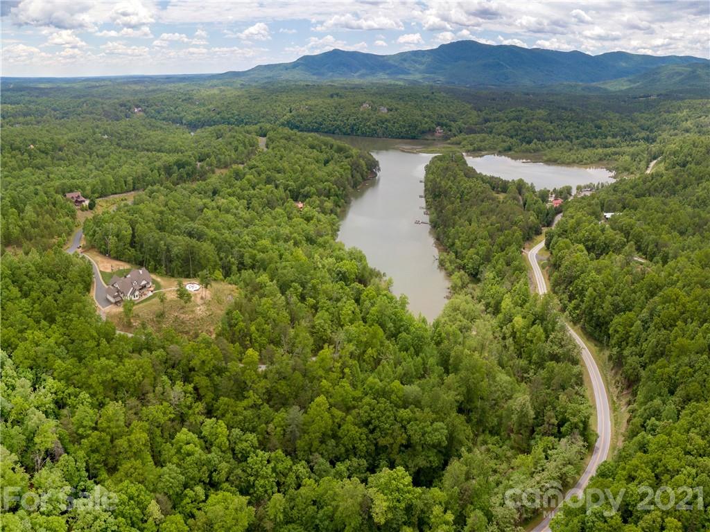 570 Parkway North Rd Mill Spring Mill Spring, NC 28756 - Photo 45 of 48 a view of lake with mountain