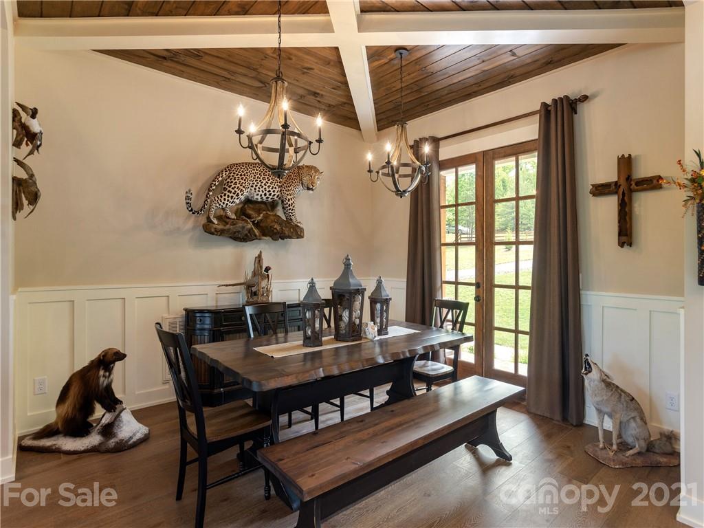 570 Parkway North Rd Mill Spring Mill Spring, NC 28756 - Photo 10 of 48 a view of a dining room with furniture and window