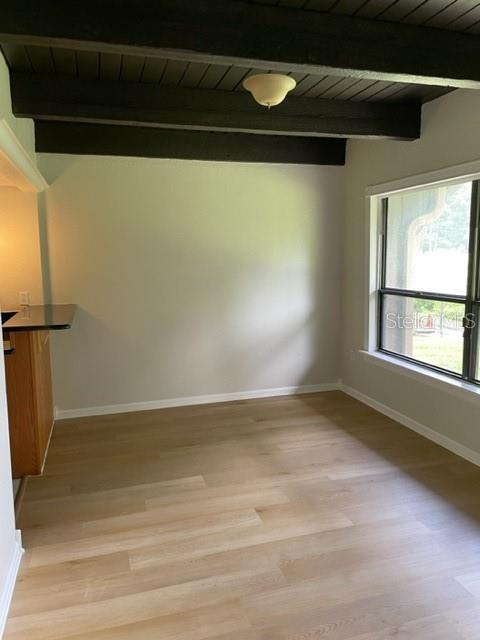 5466 Pine Creek Drive, Unit 2002 Orlando, FL 32811 - Photo 13 of 19 a view of an empty room with a window