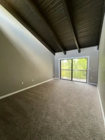 a view of large room with wooden floor