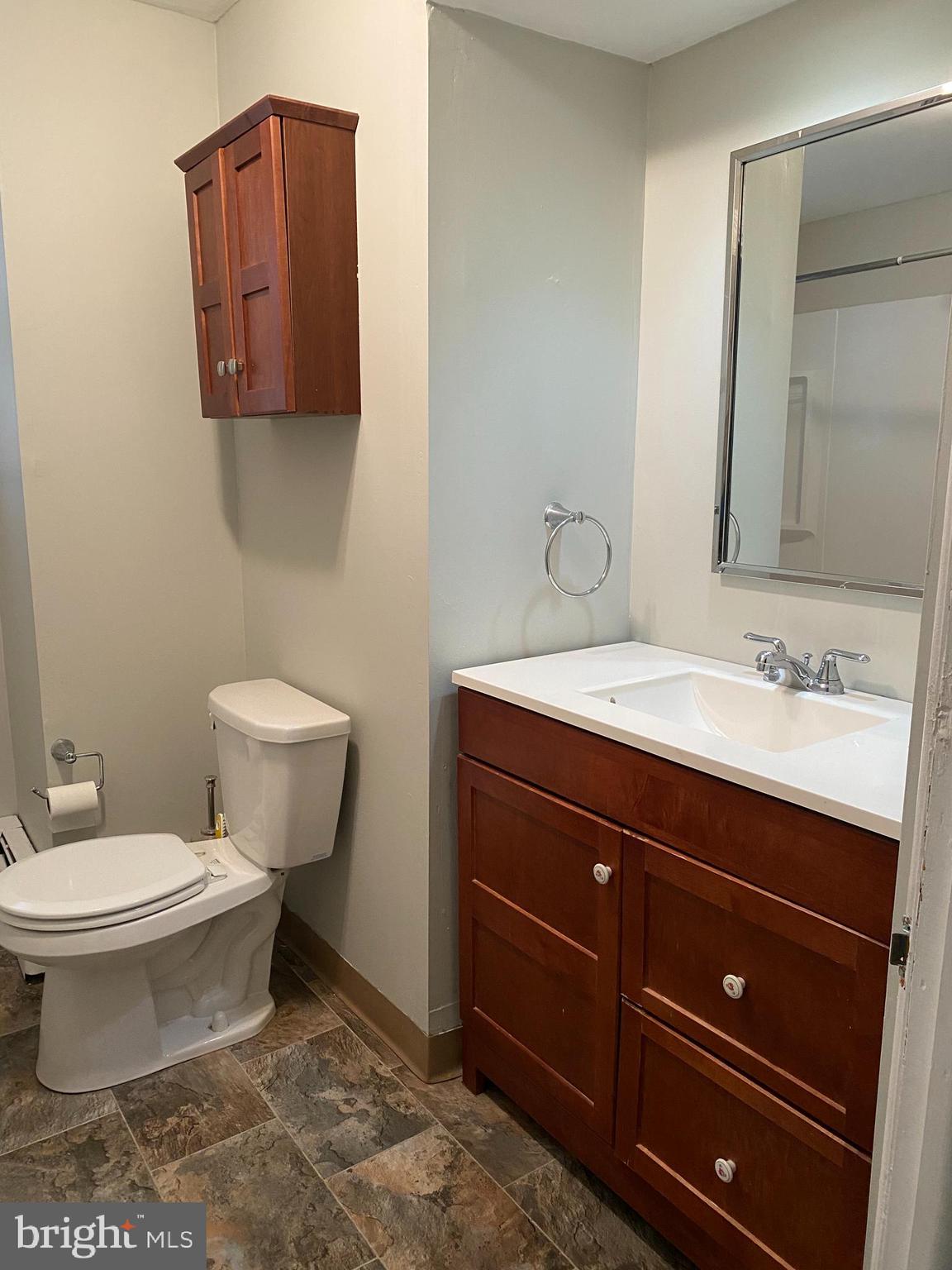 629 Convent Road Aston, PA 19014 - Photo 15 of 19 a bathroom with a toilet sink and mirror
