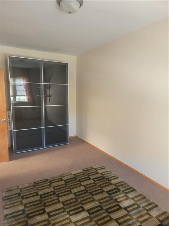 9 Corbin Place Brooklyn, NY 11235 - Photo 12 of 19 a view of an empty room with a window