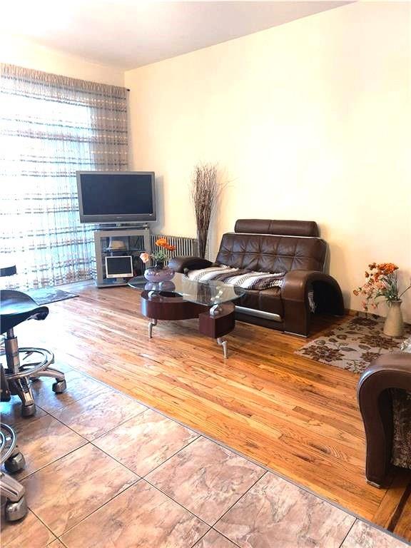 9 Corbin Place Brooklyn, NY 11235 - Photo 3 of 19 a living room with furniture