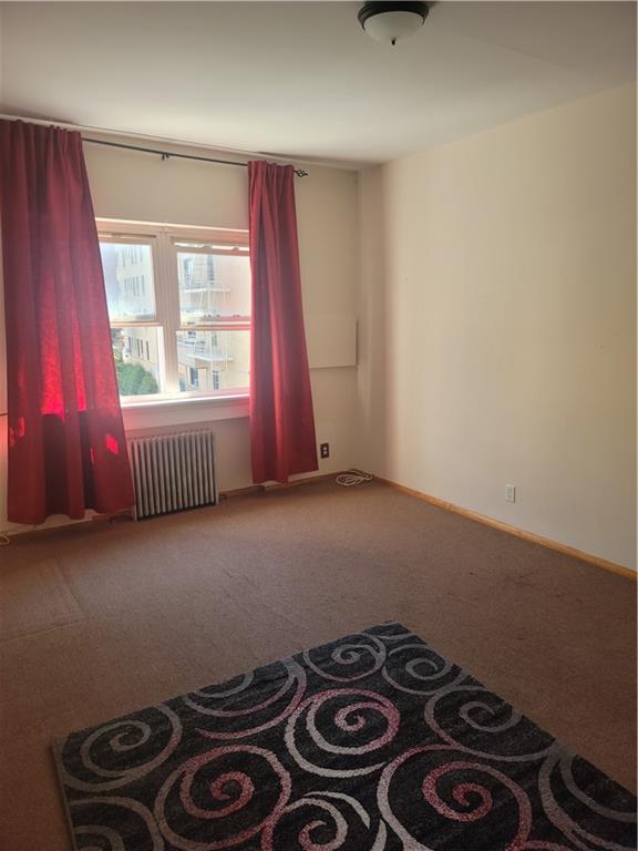 9 Corbin Place Brooklyn, NY 11235 - Photo 6 of 19 a view of a room with furniture and a window