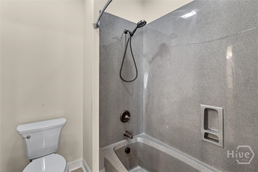 197 Cubbedge Drive Rincon, GA 31326 - Photo 30 of 43 Guest en-suite …Jack and Jill, marble surround tub/shower combo