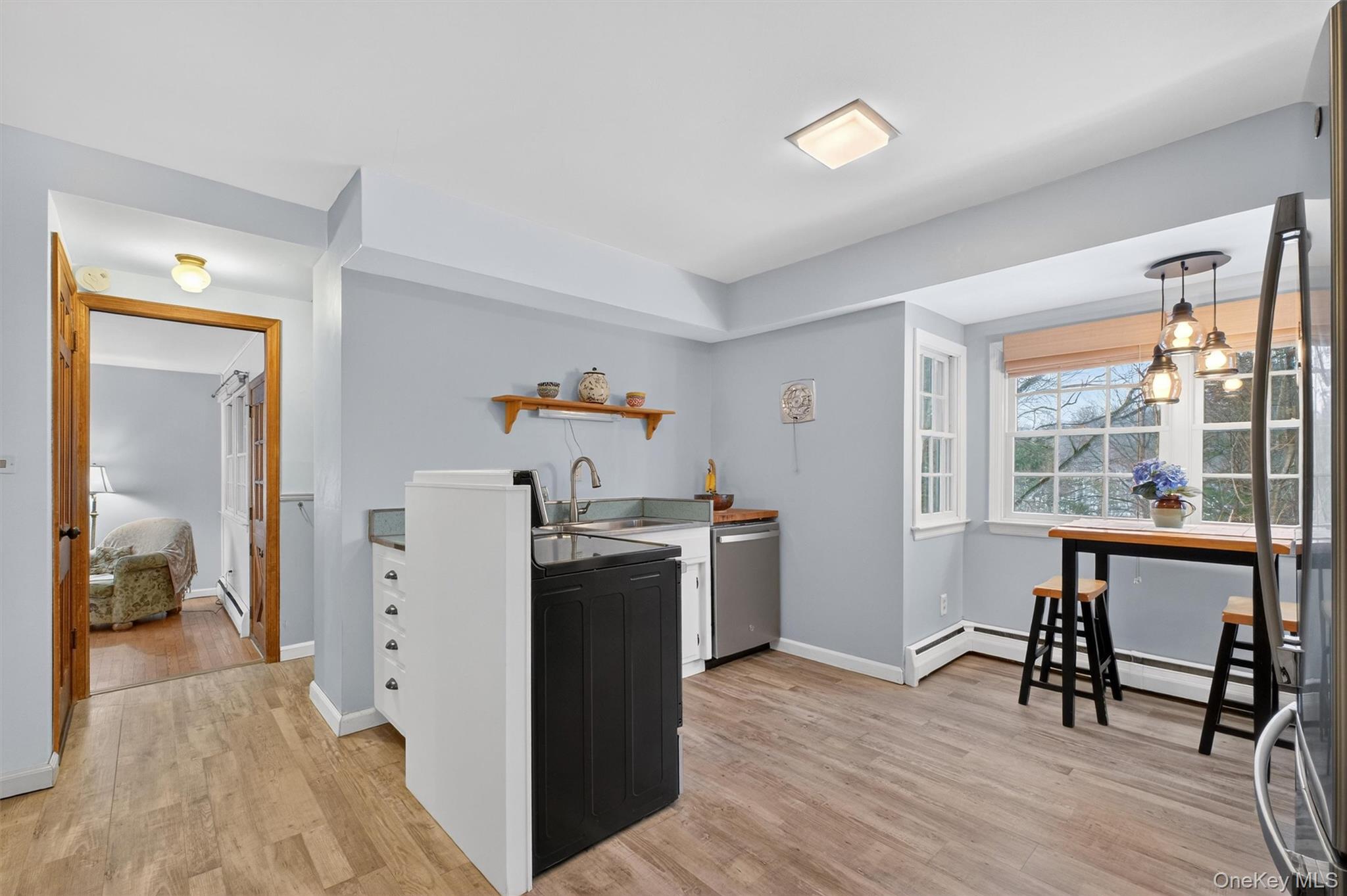 22 Hatfield Road Mahopac, NY 10541 - Photo 12 of 46 This angle of the eat in kitchen showing hall to family room.