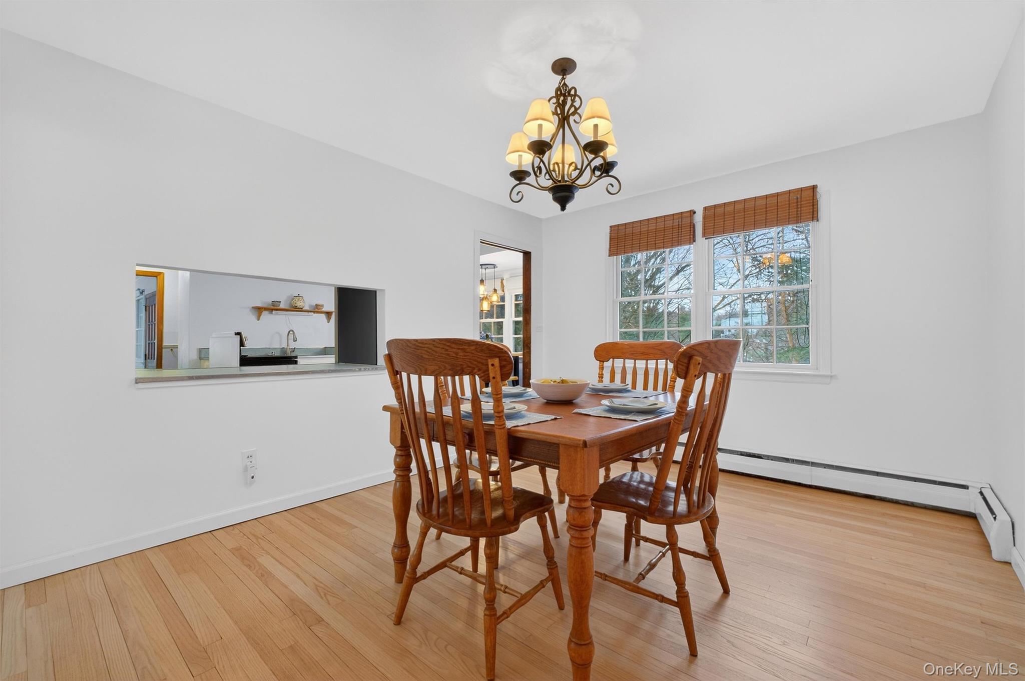 22 Hatfield Road Mahopac, NY 10541 - Photo 9 of 46 Formal dining room showing the pass through to kitchen and a pocket door for formal dining.