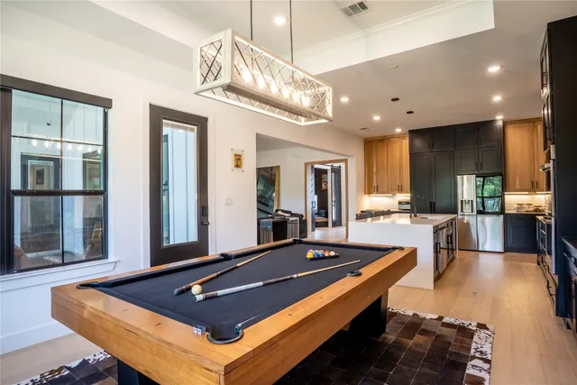 a kitchen with a sink and stove